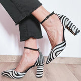 Zebra print pumps with ankle strap