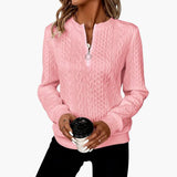Women's pullover with zipper at the neckline and cable knit surface