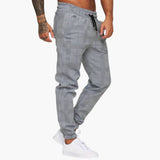 Men's pants with elastic waistband and checkered surface