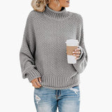 Women's sweater with high neckline and ribbed hem