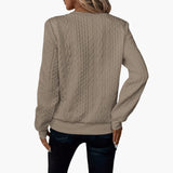 Women's pullover with zipper at the neckline and cable knit surface