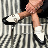 Decollete with strap and contrast detail