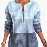 Women's pullover with zip neckline and ribbed surface