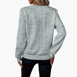 Women's pullover with zipper at the neckline and cable knit surface