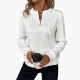 Women's pullover with zipper at the neckline and cable knit surface