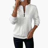 Women's pullover with zipper at the neckline and cable knit surface