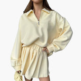 Women's Pullover with Half-Zip and Pleated Skirt