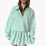 Women's Pullover with Half-Zip and Pleated Skirt