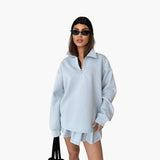 Women's Pullover with Half-Zip and Pleated Skirt
