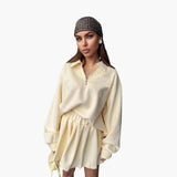 Women's Pullover with Half-Zip and Pleated Skirt