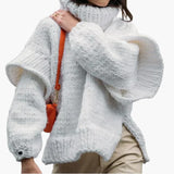 Women's oversized sweater with a roll neck and ribbed hem