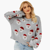 Women's pullover with round neckline and festive pattern