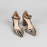 Zebra-print pointed toe pumps with ankle strap